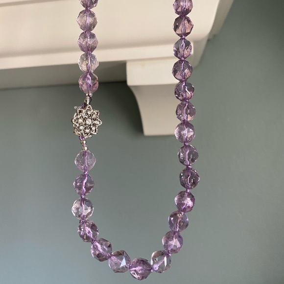 Faceted natural amethyst necklace with a silver tone clasp